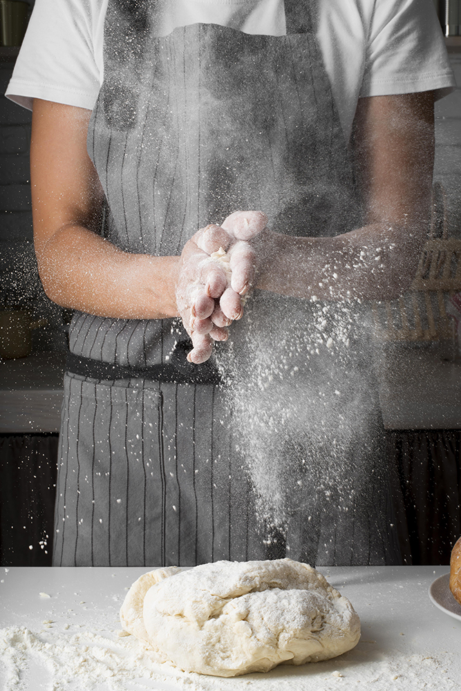 Baker with flour